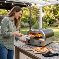 12 In. Propane Pizza Oven, Outdoor Pizza Oven in Black with Rotating Pizza Stone, Glove and Pizza Cutter — Lifestyle
